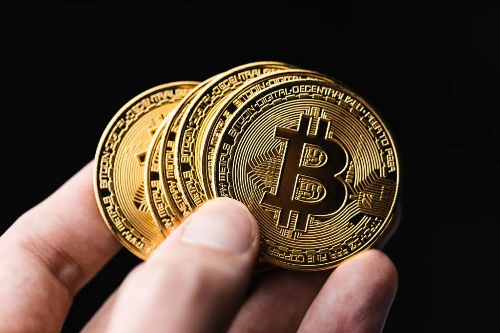 Hand Holding Bitcoin